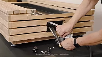 How to Assemble and Operate your Gas Fireplace? 11 Plugging the ignitor wire and grounding wire into thesparker